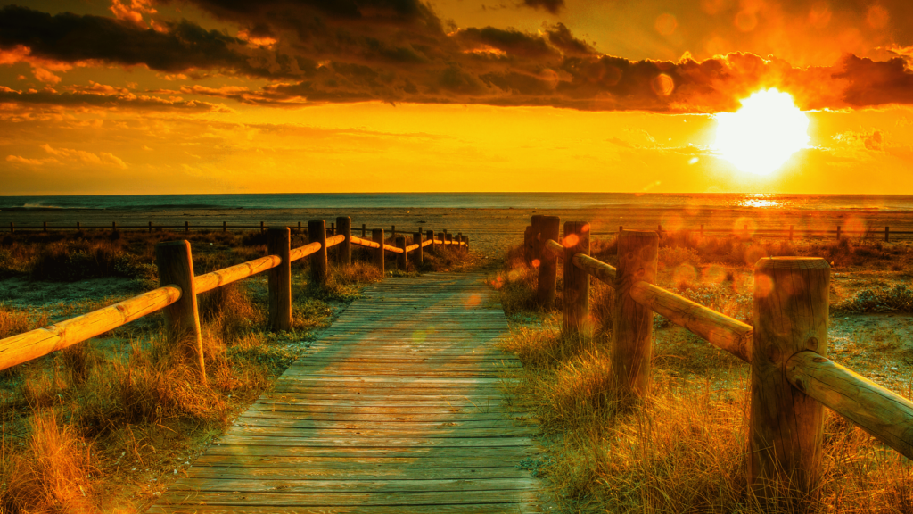 Sunset on beach with access dock