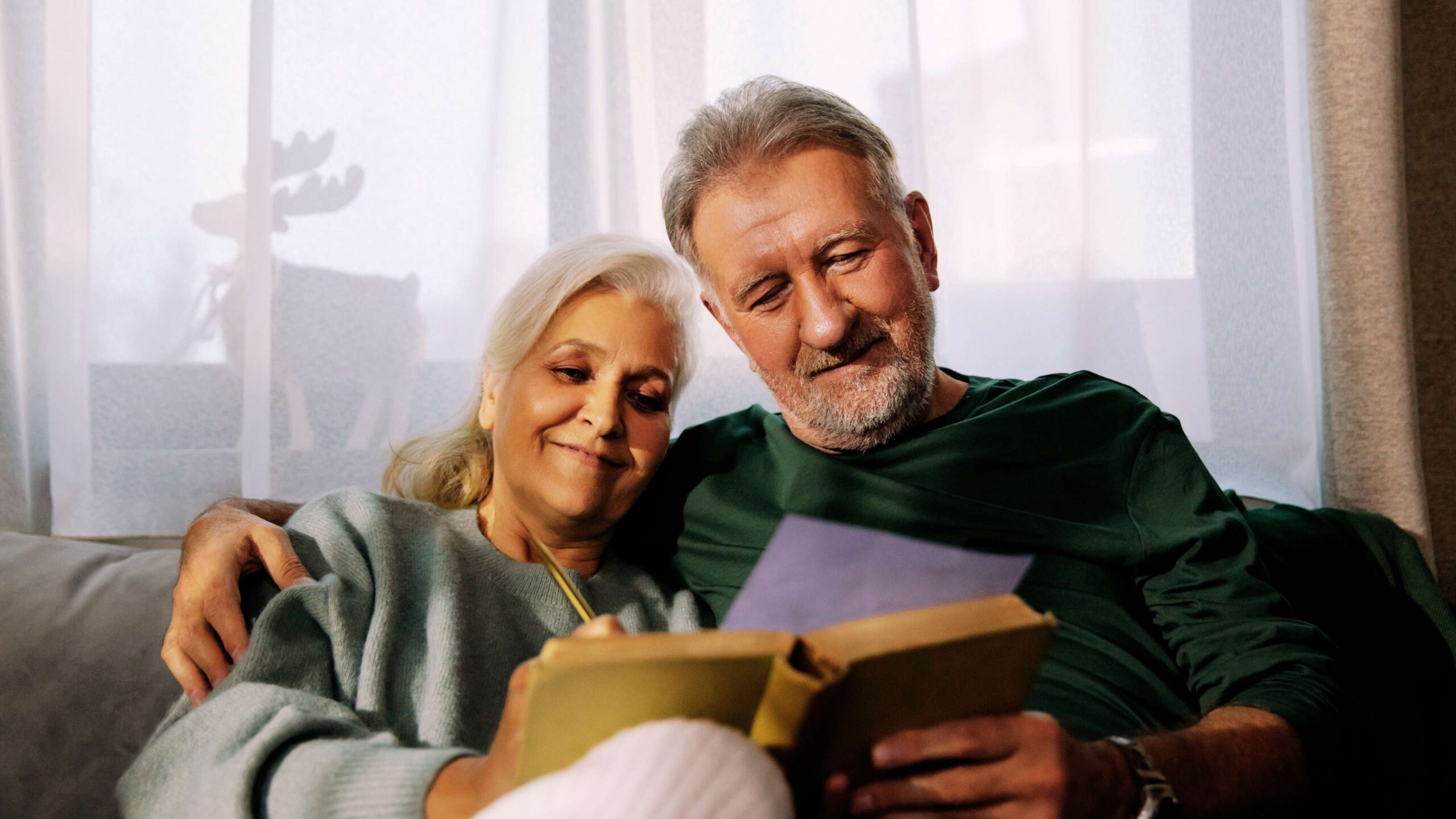 Couple Reading Book Together