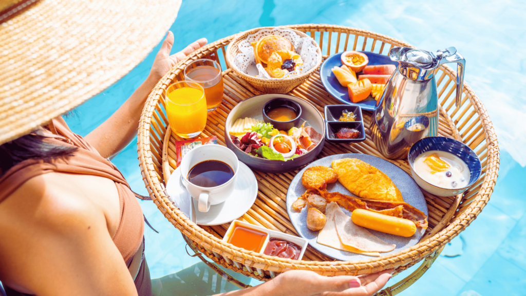 food on tray above pool