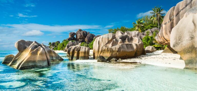 Seychelles beach blue water rocks