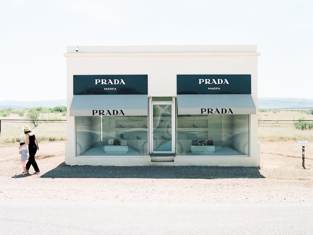 Minimalist Prada storefront installation in Marfa, Texas under clear skies.