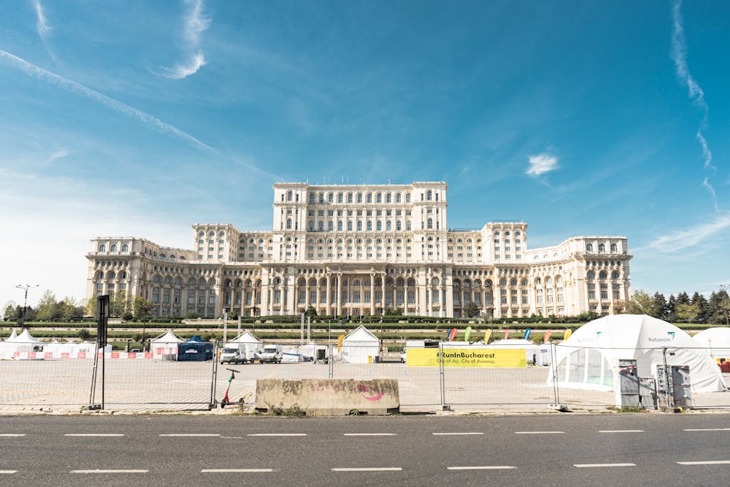 A sunny view of the iconic Palace of the Parliament in Bucharest, Romania.