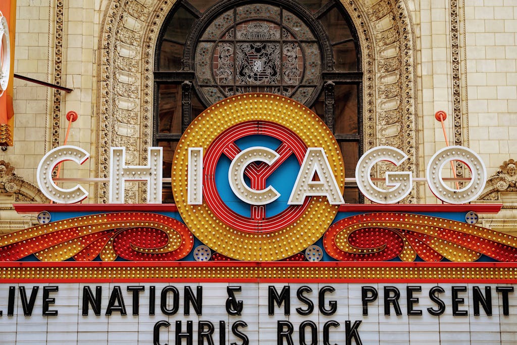 Close-up of the famous Chicago Theatre marquee with bright signage and intricate architecture.