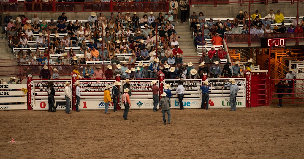 Spectators enjoy the lively atmosphere at Cheyenne Frontier Days rodeo event in Wyoming.