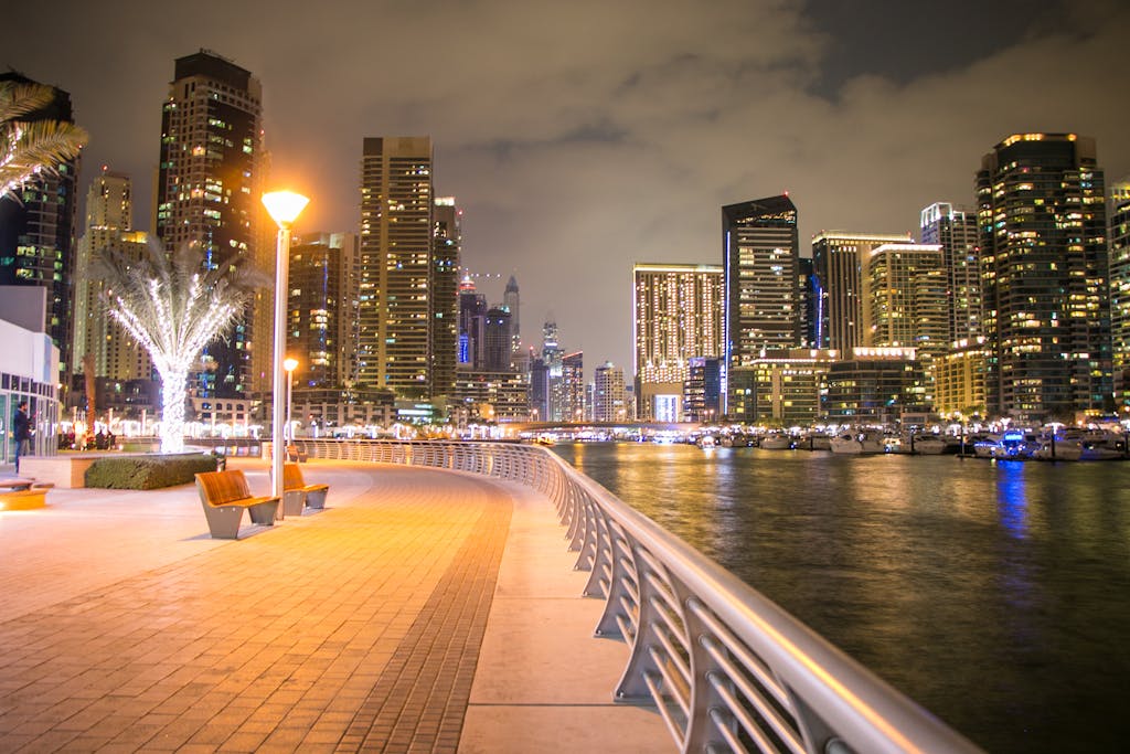 Beautiful night view of Dubai Marina, showcasing the stunning illuminated skyline and waterfront promenade.