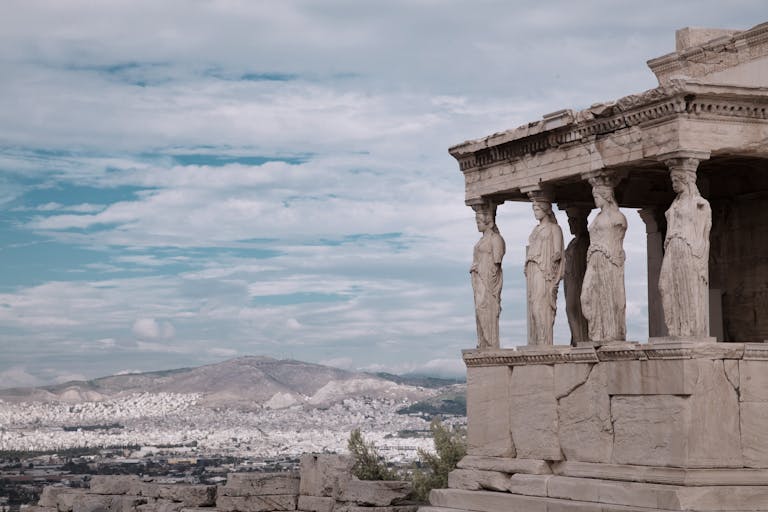 Erechtheion temple on the Acropolis, Athens, with iconic Caryatids statues.