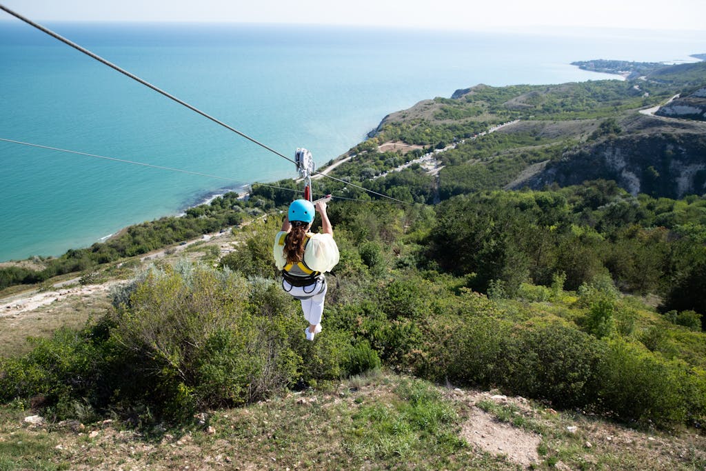 Experience the thrill of zip lining over a beautiful coastal landscape in Bulgaria.