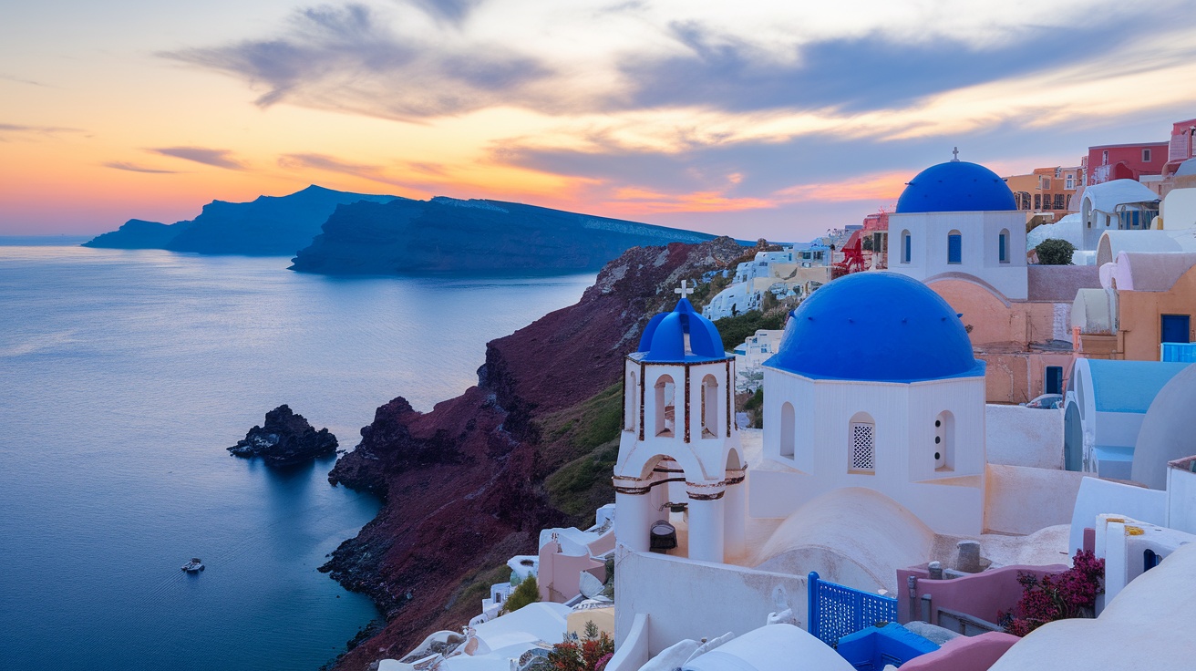 A picturesque view of Santorini at sunset, showcasing white buildings with blue domes and a calm sea.