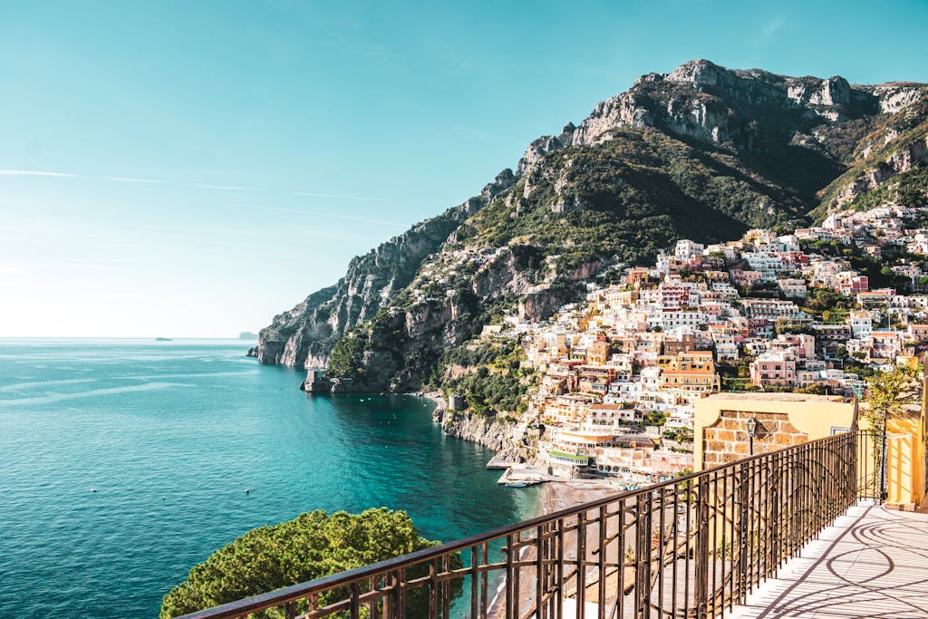 Stunning view of Positano's colorful buildings on the cliffs overlooking the Mediterranean Sea.